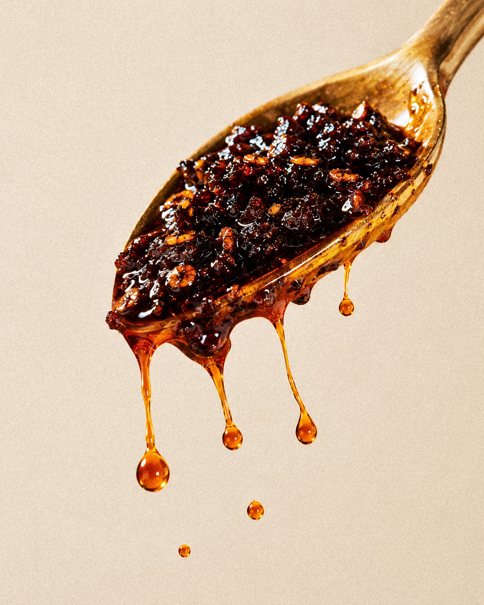 Vaquero Chile Morita on a spoon with a glossy drip