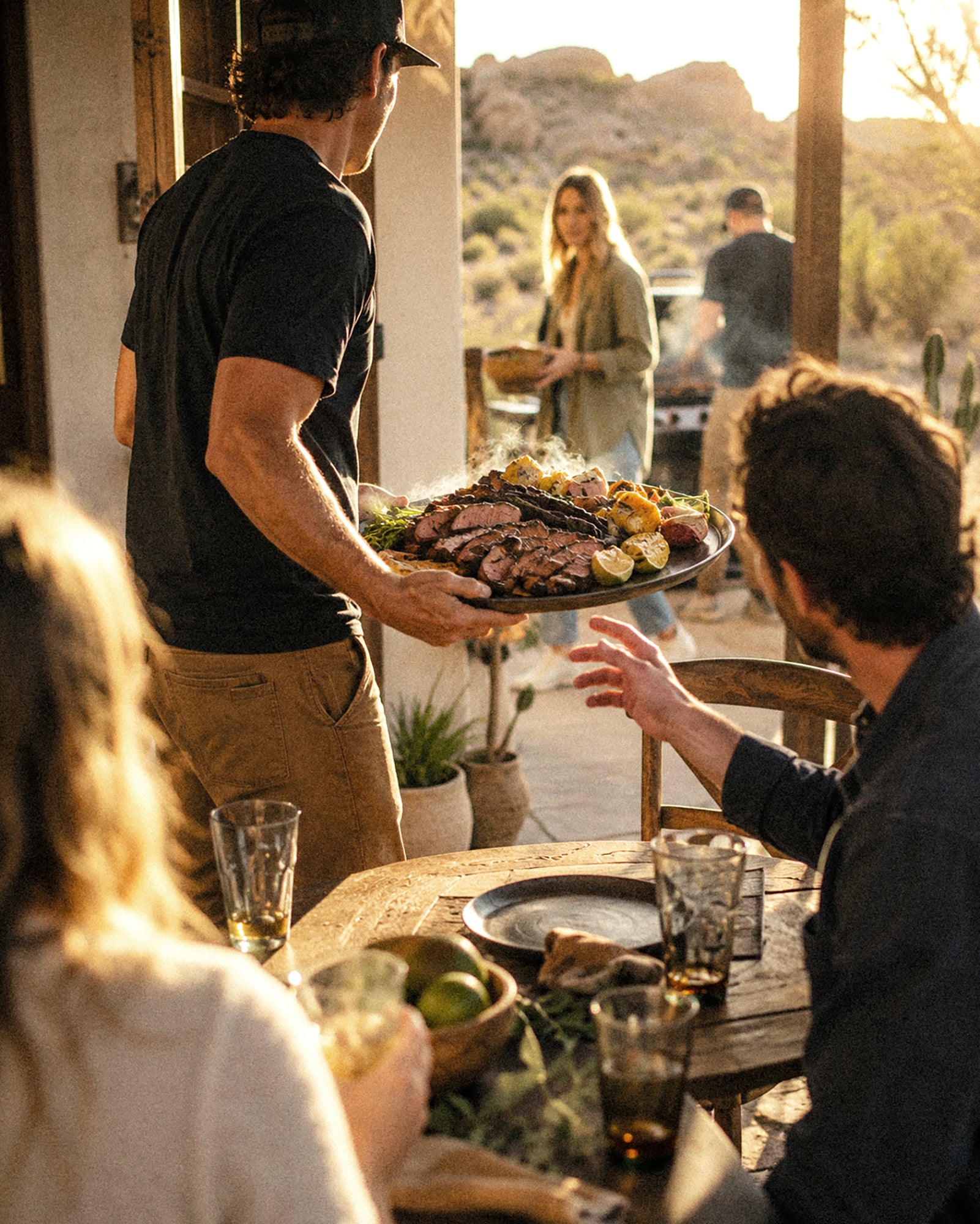 Serving a platter at a desert gathering